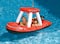 Swim Central 5ft. Inflatable Red & White Fire Boat Ride-On Water Squirter Swimming Pool Toy